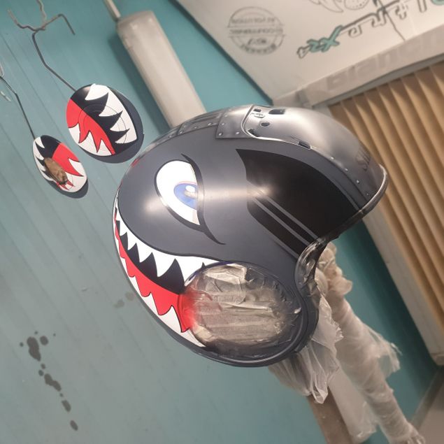 Sharky scooter helmet.